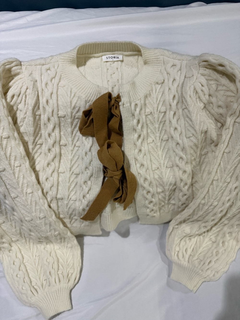 Storia Cream Cable-Knit Puff Sleeve Cardigan with Brown Ribbon